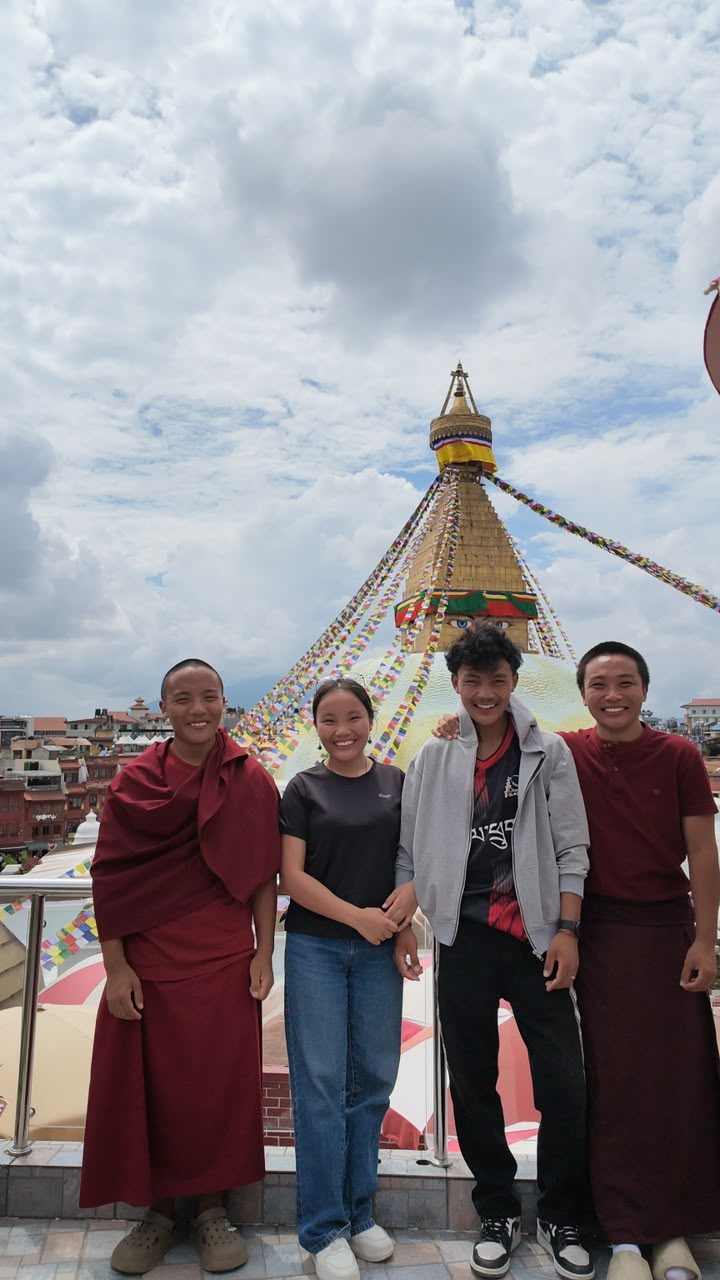 Sonam with her three brothers at Boudhanath, Kathmandu